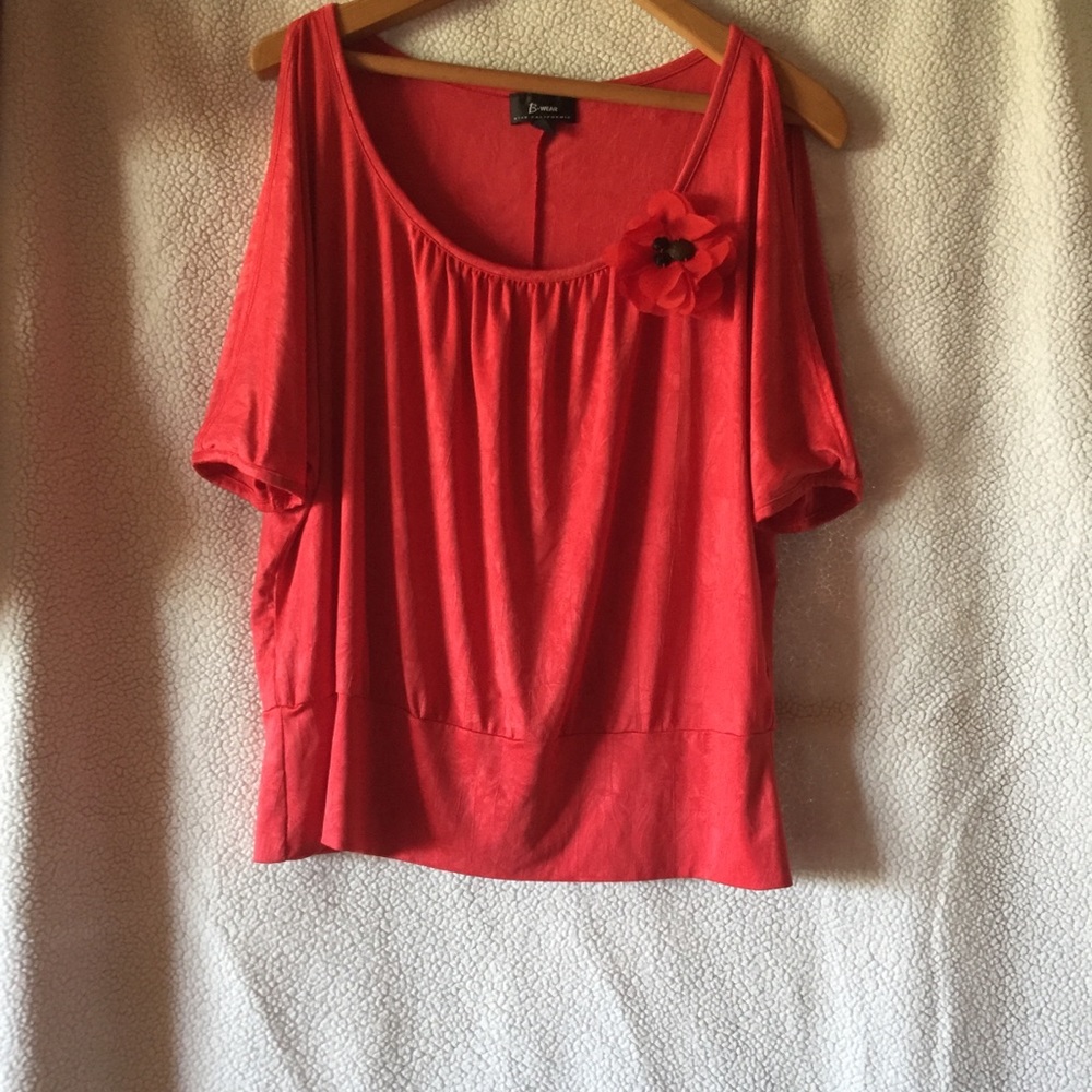 B wear coral short sleeve with slit in sleeve. XL
